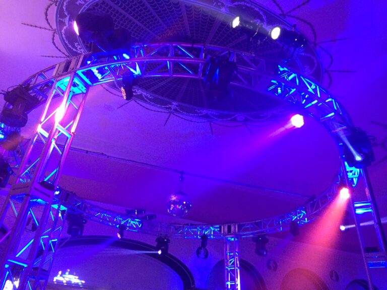 Silver circular box truss ring with moving lights